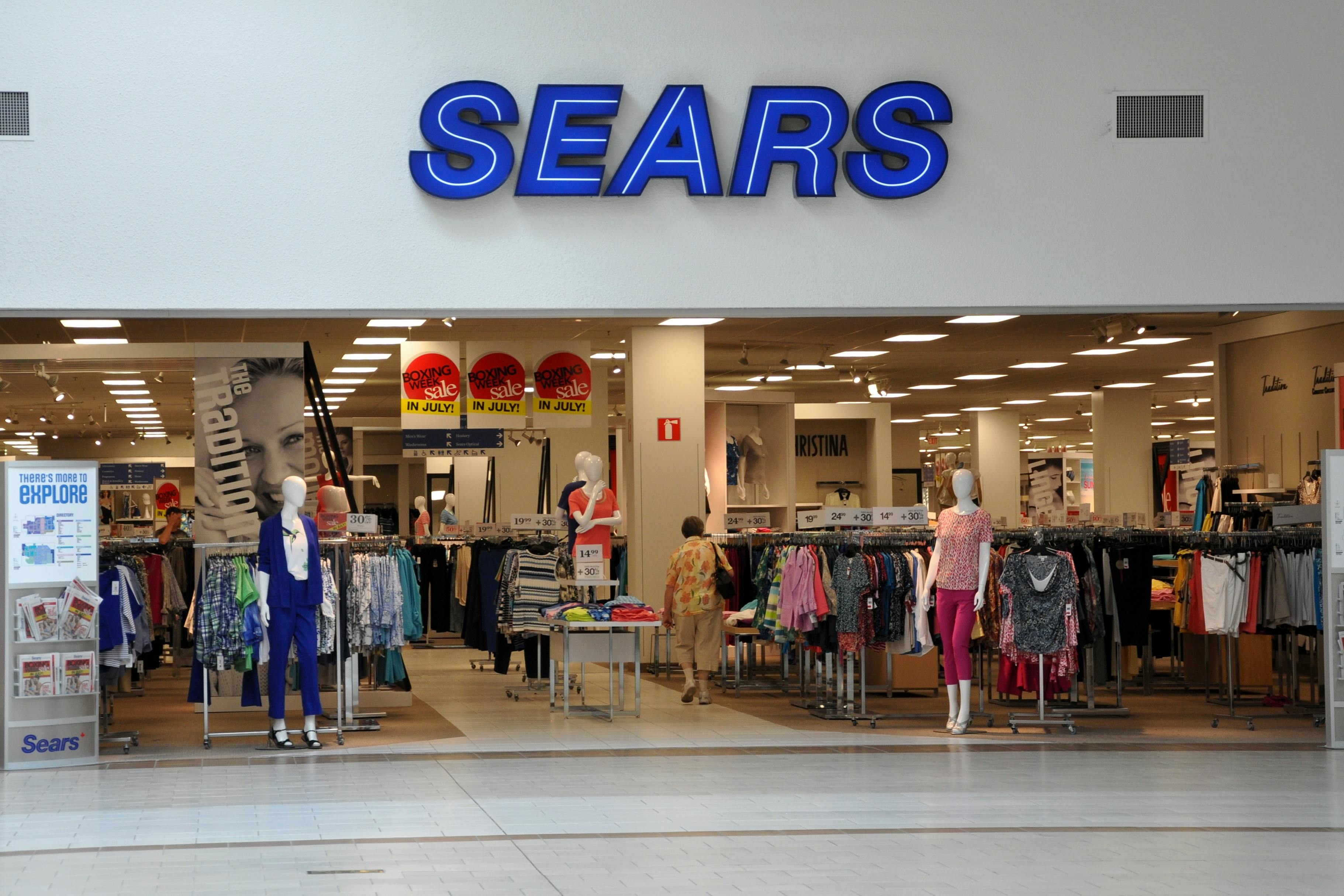 Sears store front entrance inside a mall.