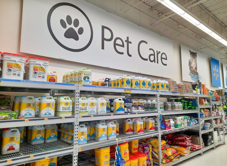 Pet Care sign above cat litter products at Walmart