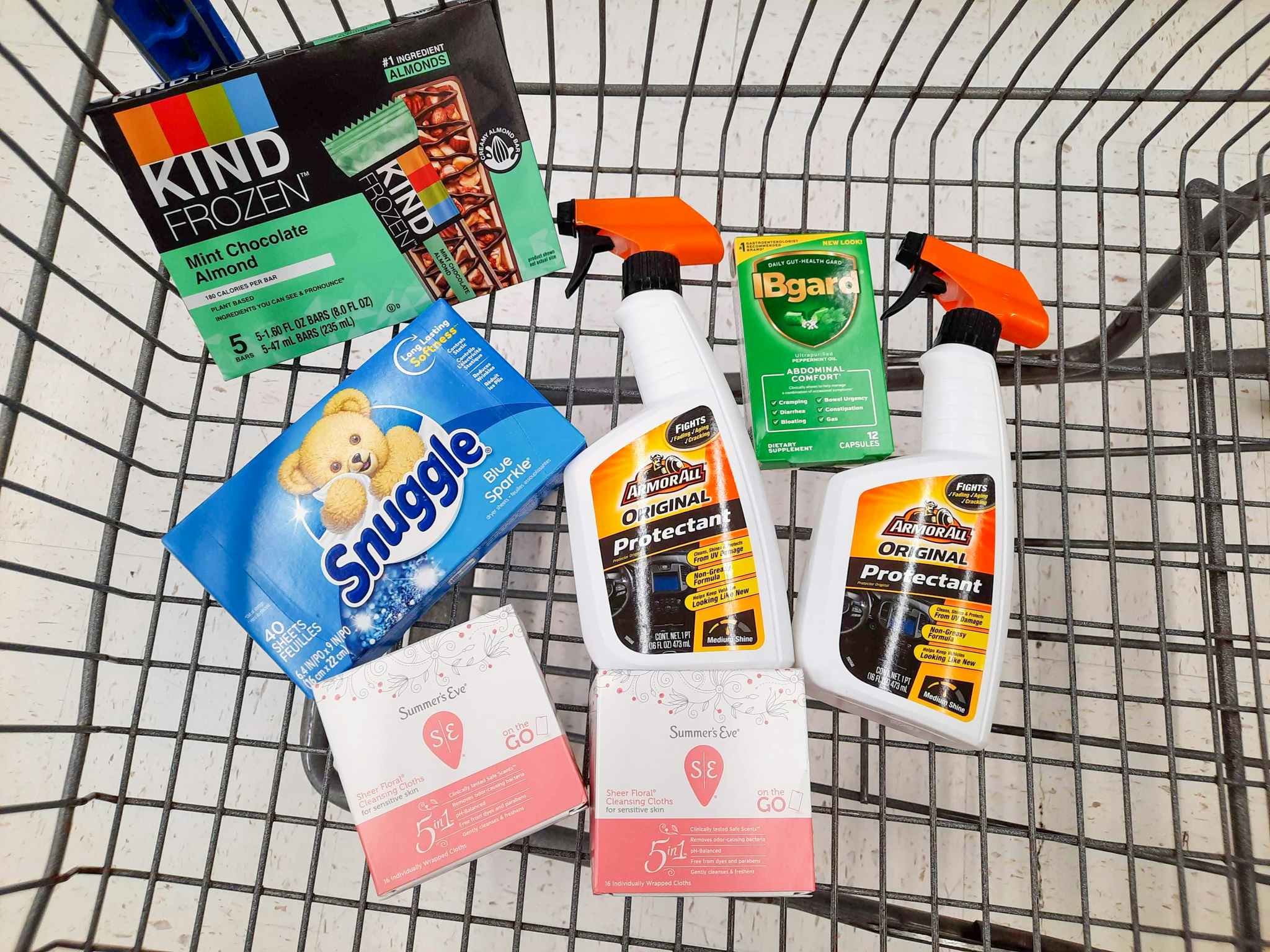 Armor All, Summer's Eve, Ibgurd, Snuggle, and Kind products in Walmart shopping cart