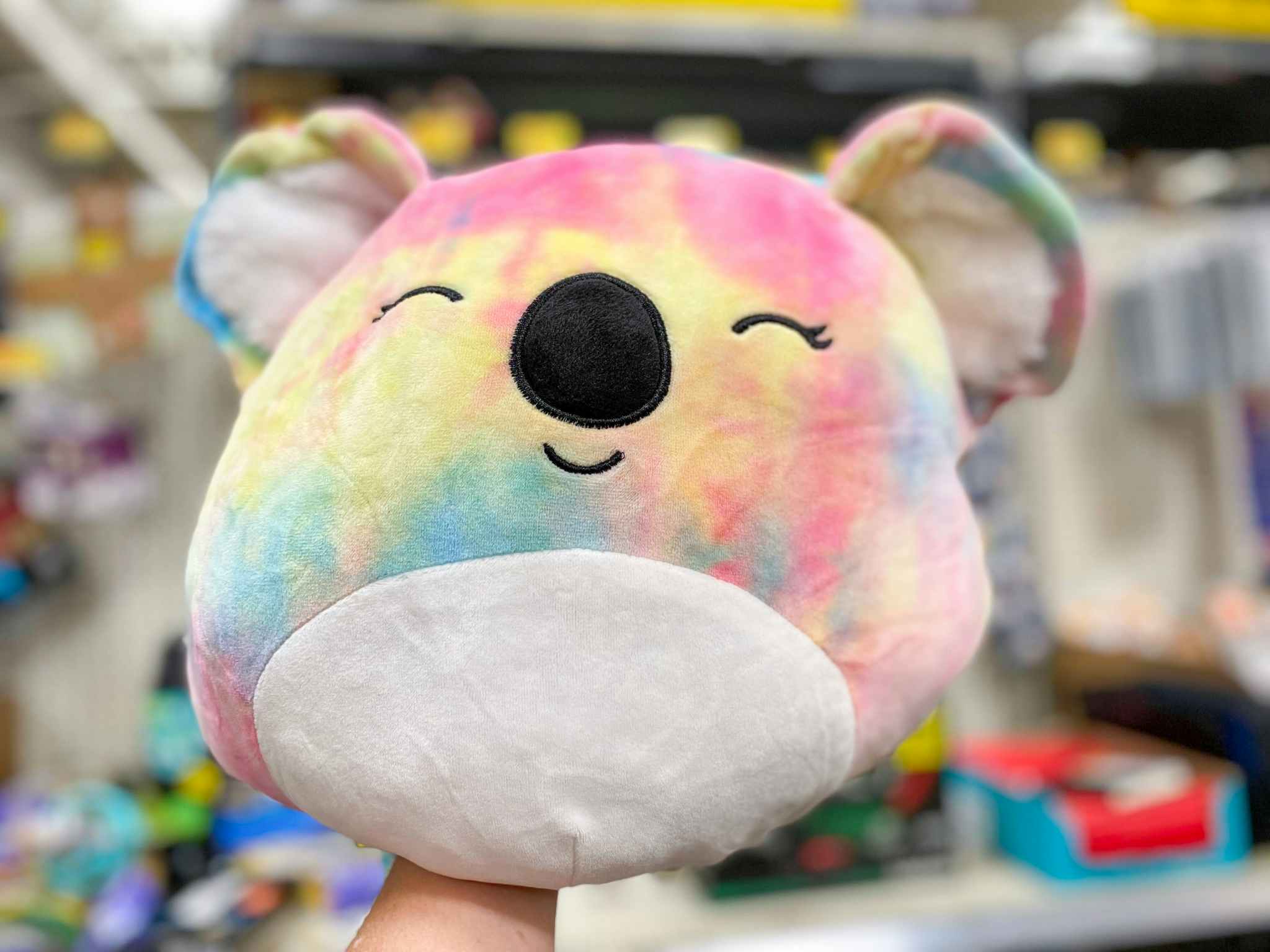 walmart squishmallows flip-a-mallow hand holding koala