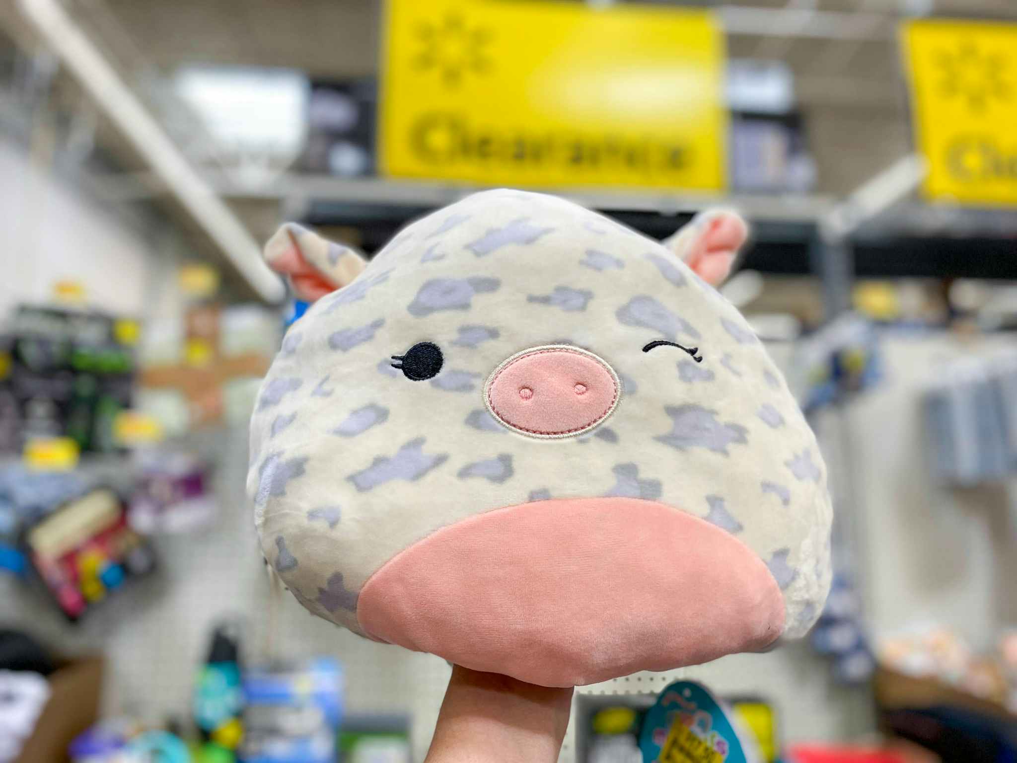 walmart squishmallows flip-a-mallow hand holding pig