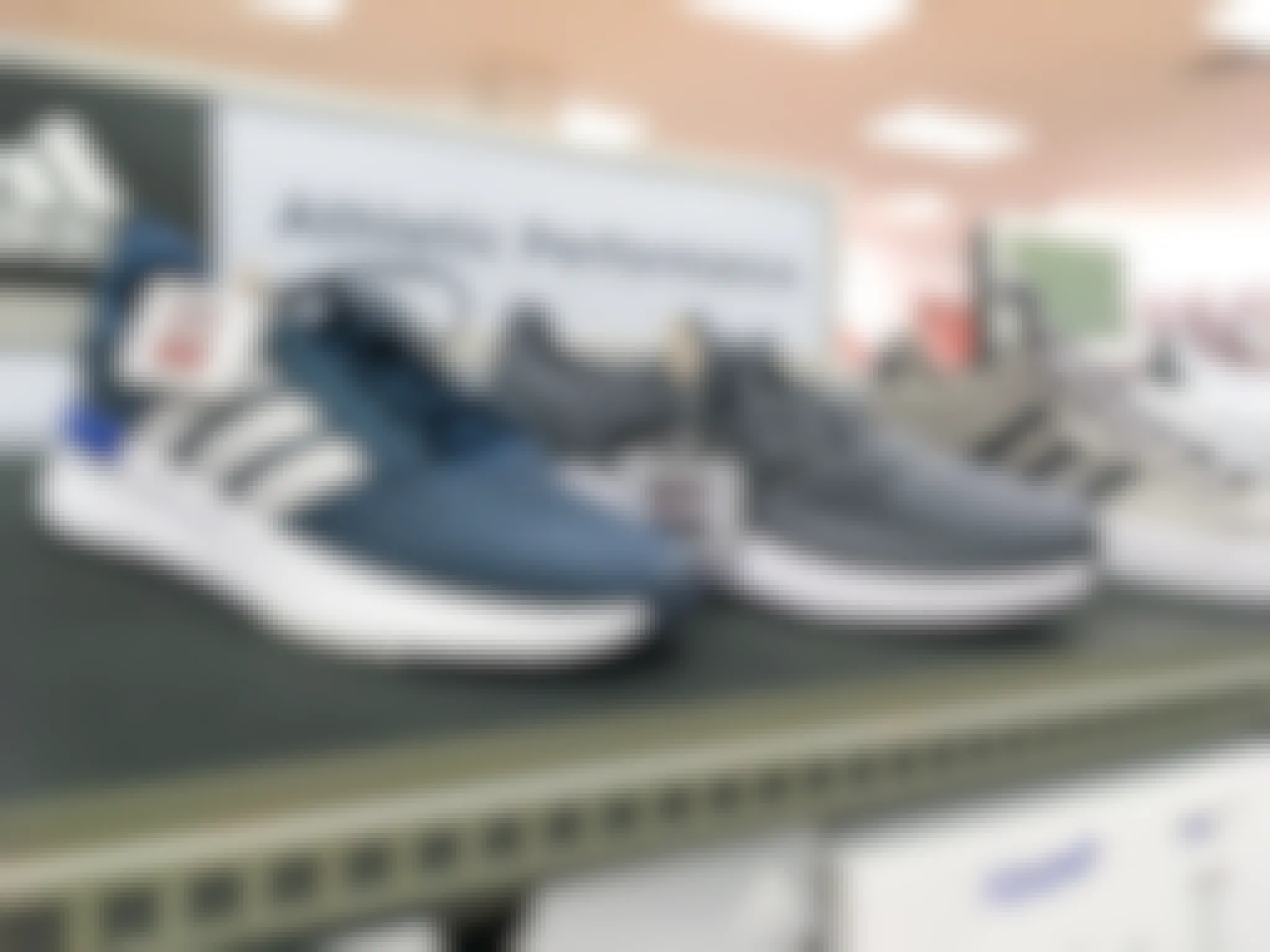 Adidas sneakers on display in the shoe section of Kohl's
