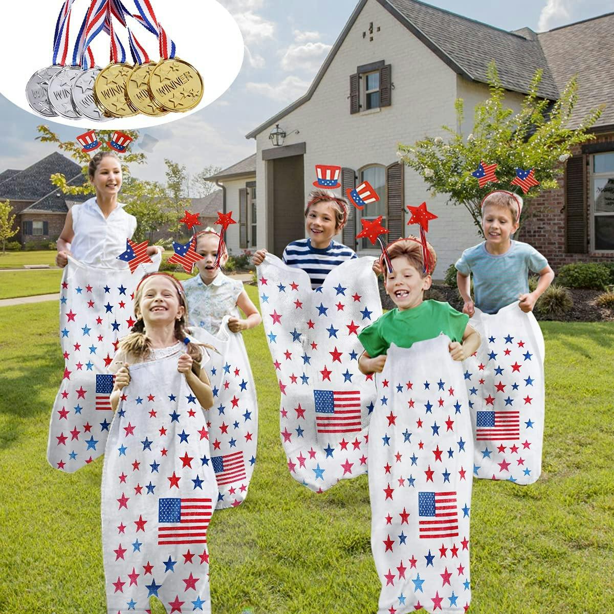 A family of six people racing in red, white, and blue potato sacks.