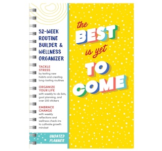 Yelloy and white planner on a white background