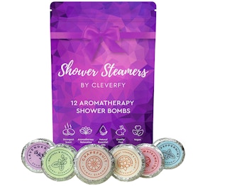 Purple and pink bag on a white background with shower steamers at the bottom