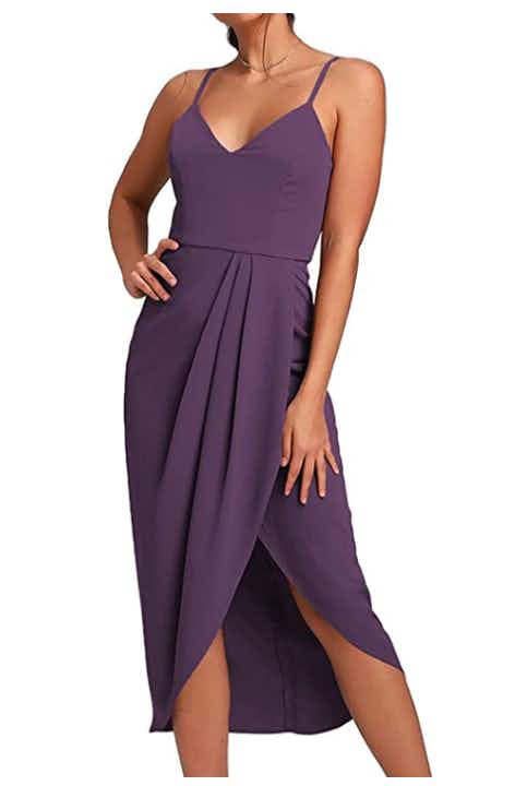 Purple cocktail dress on white background
