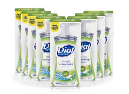 Eight hand soap bottles on a white background