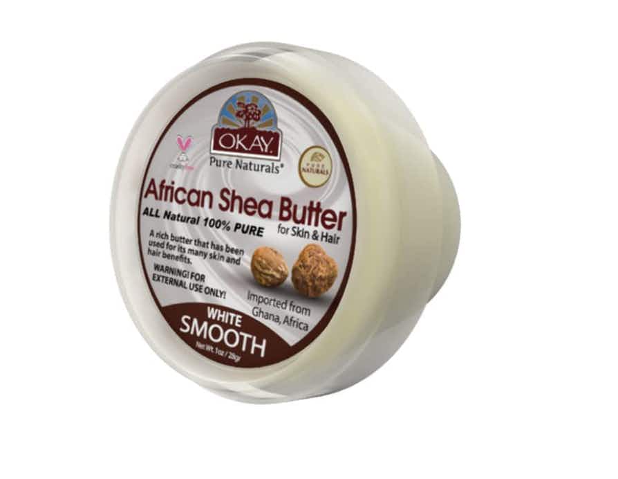 Raw shea butter container on a white background 