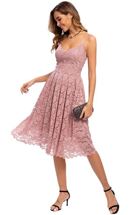 A lace pink dress on white background