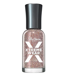 Glitter nail polish on a white background