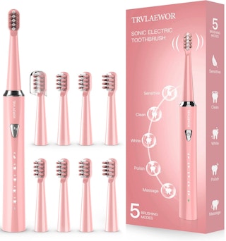 An electric toothbrush with eight brush heads.