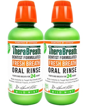 Two bottles of Therabreath Oral Rinse on white background