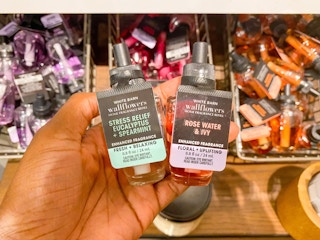 wallflower fragrance refills in someones hand