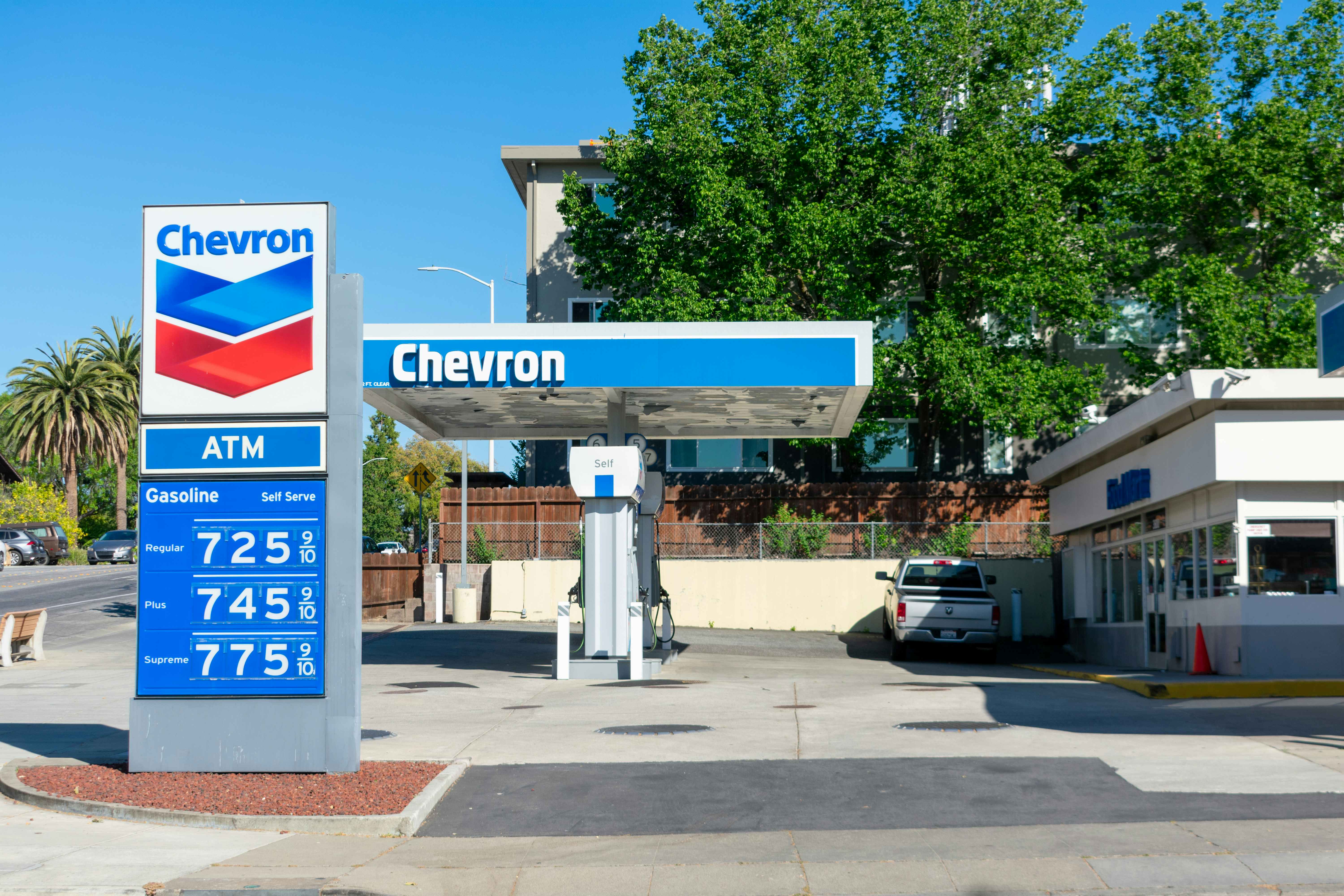 Chevron gas station with a sign indicating the price of gas at over $7 per gallon. 