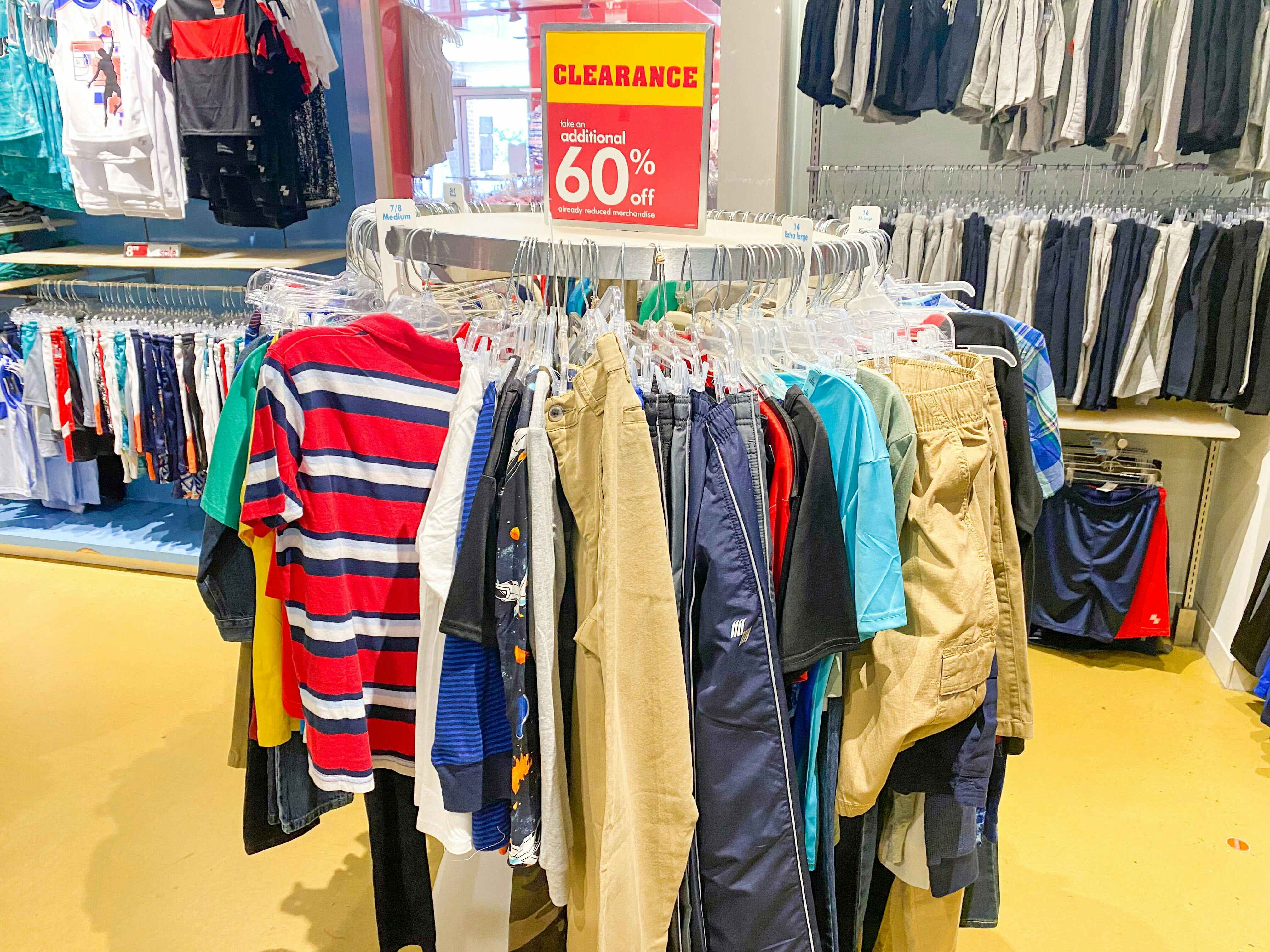 A clearance rack of kids clothing at The Childrens Place.