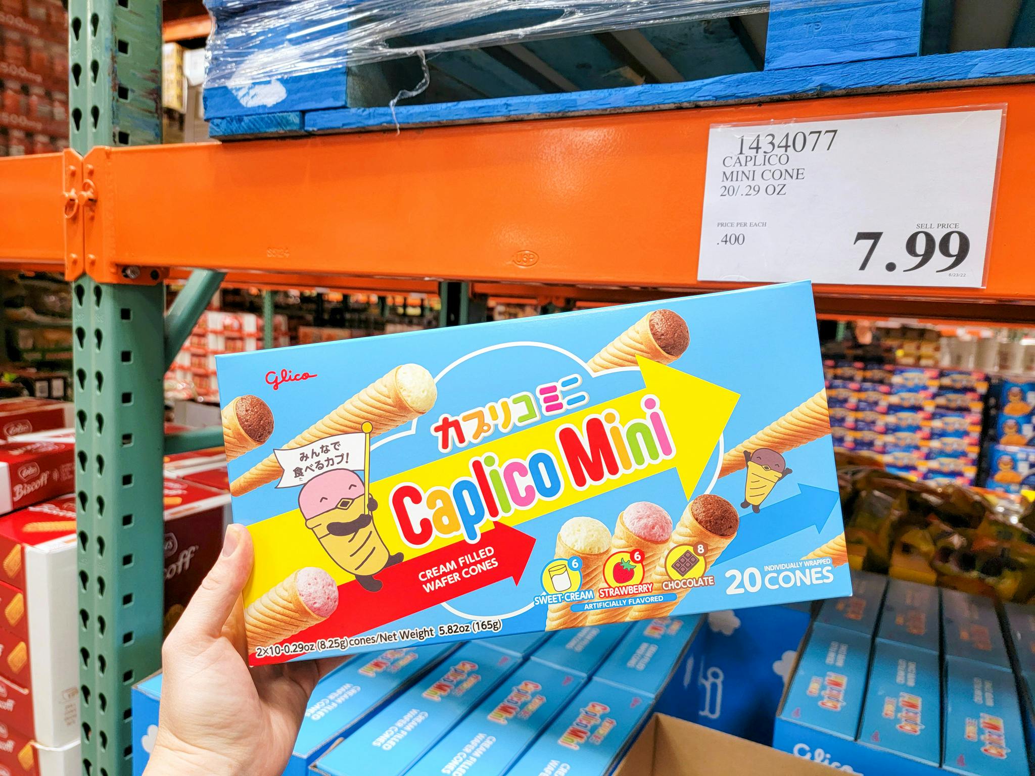 hand holding a box of caplico mini cones