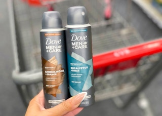 hand holding dove men+ dry spray in front of cvs cart
