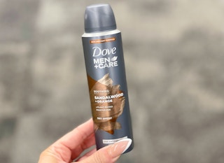 hand holding dove sandalwood dry spray
