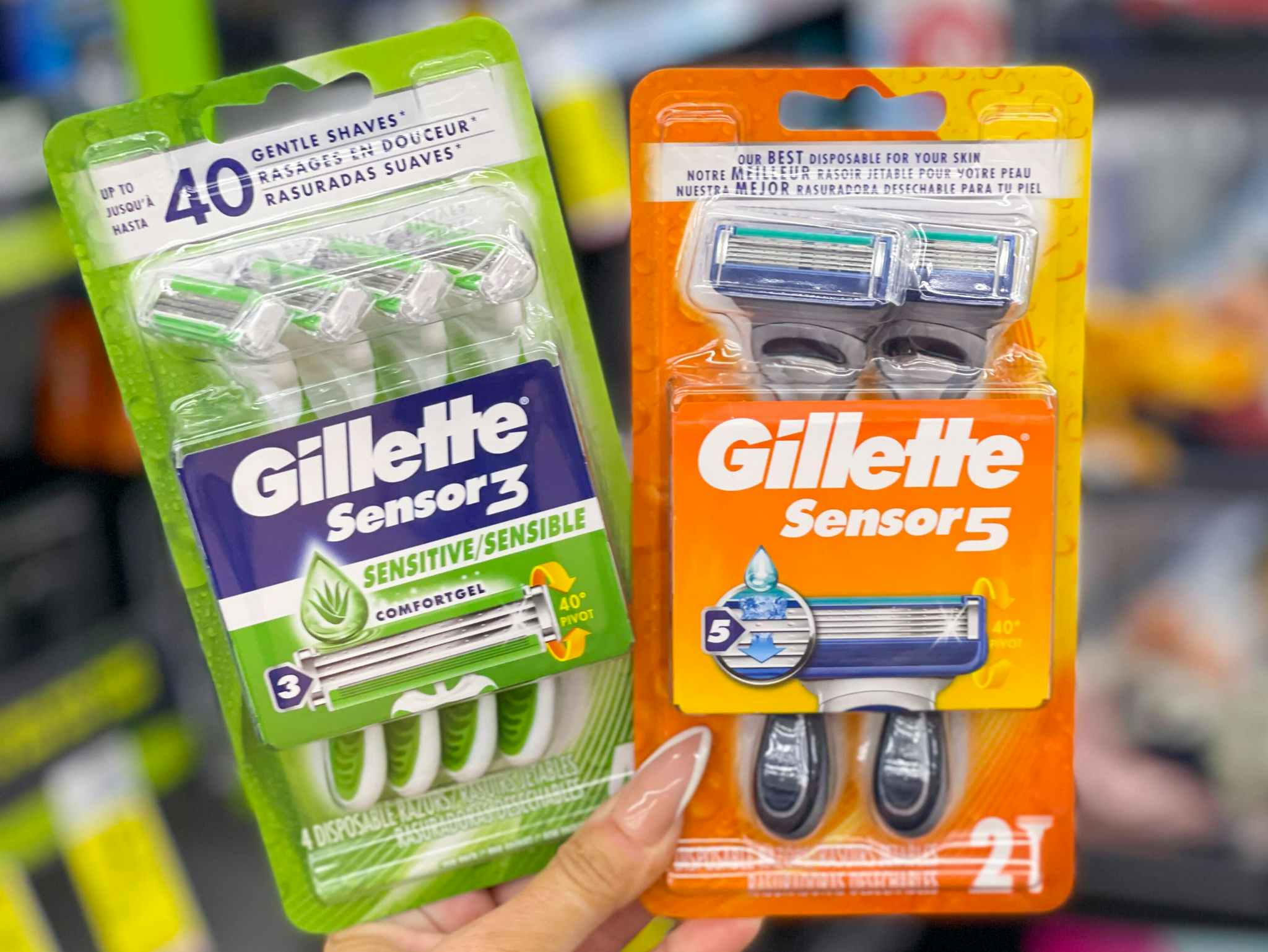 gillette disposable razors held in hand