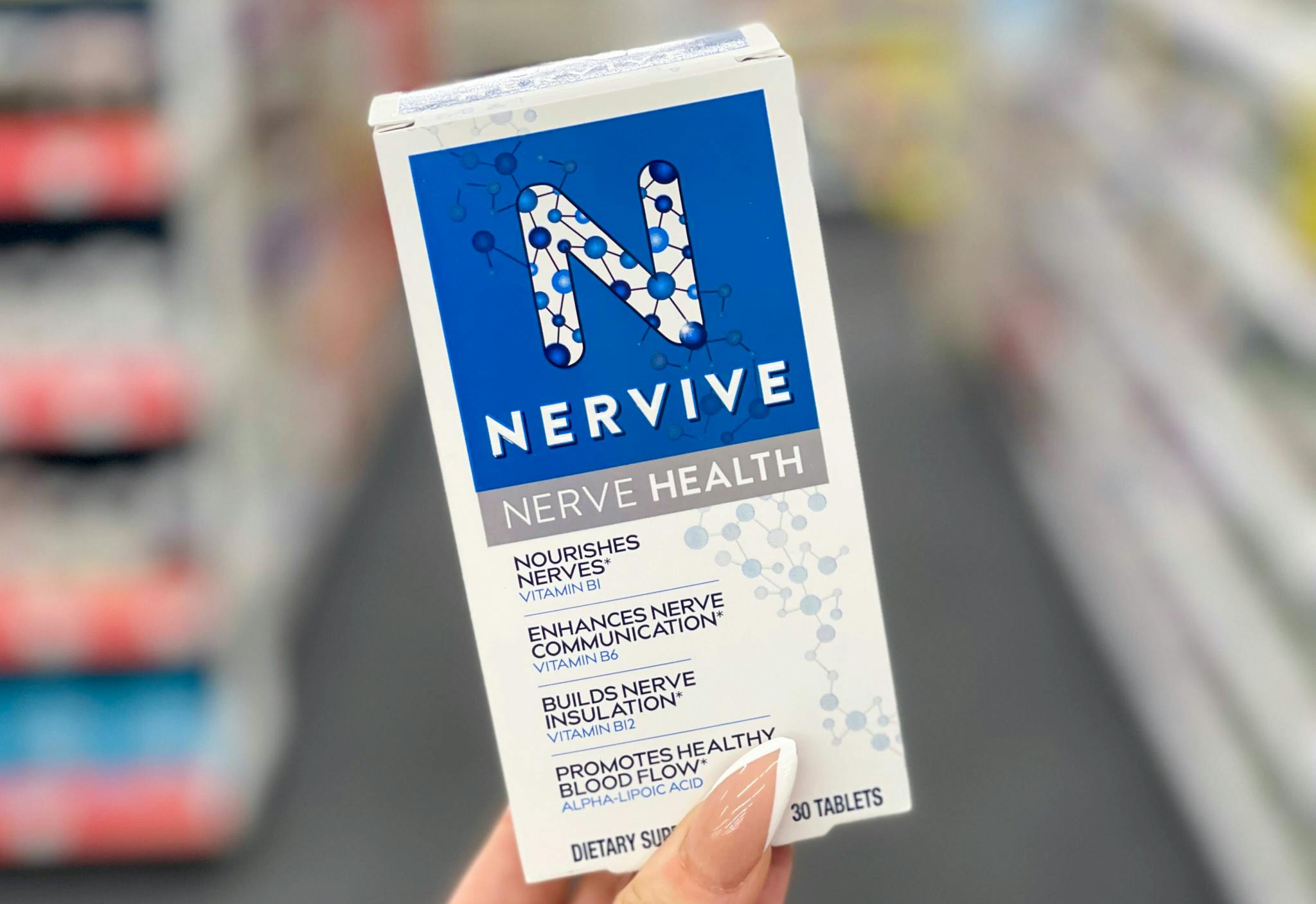 nervive nerve health held in hand