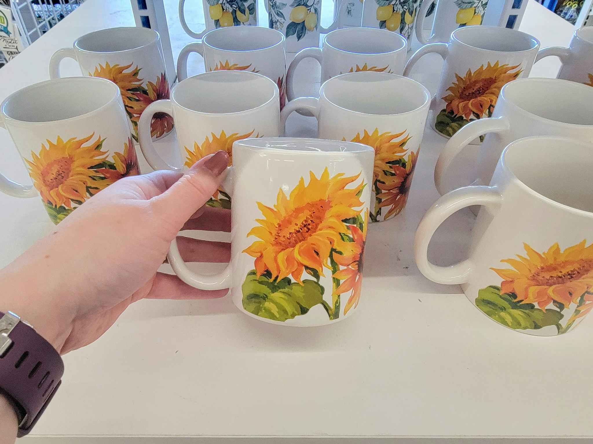white mugs with sunflowers