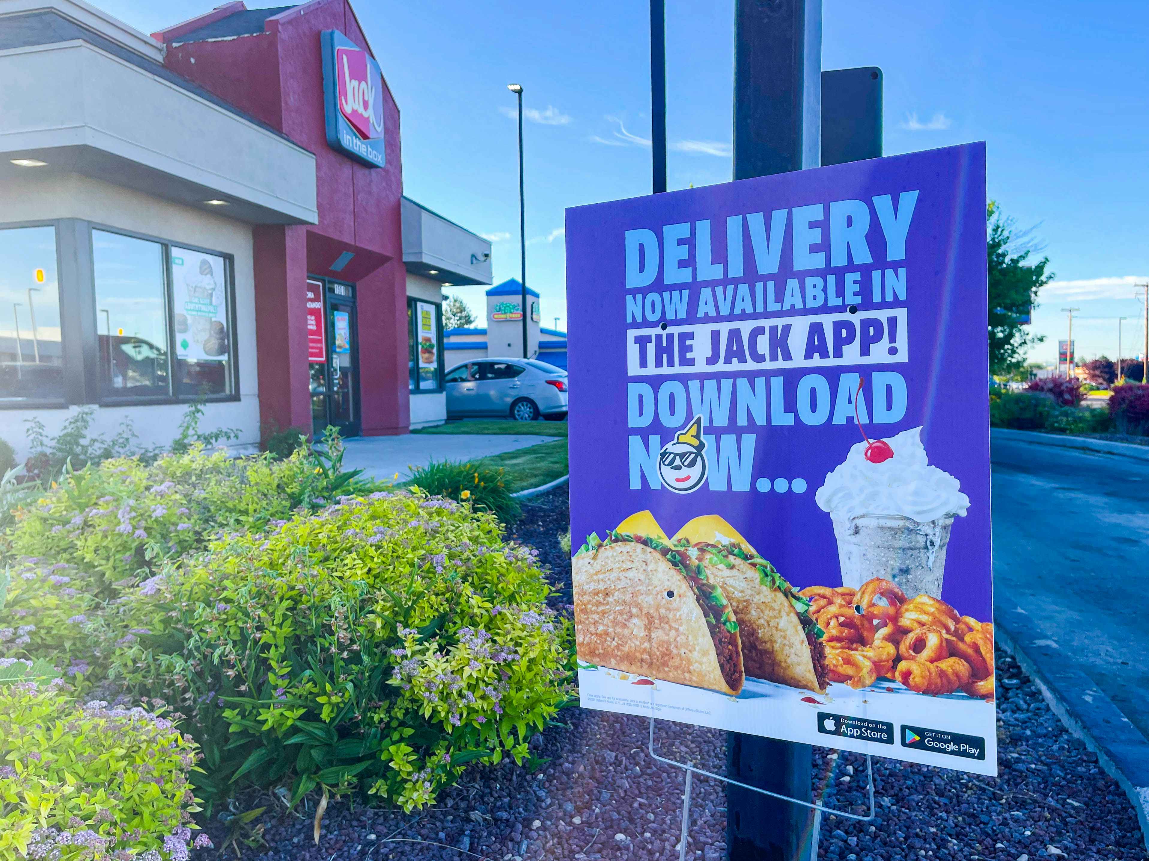 delivery with the jack in the box app sign outside store 