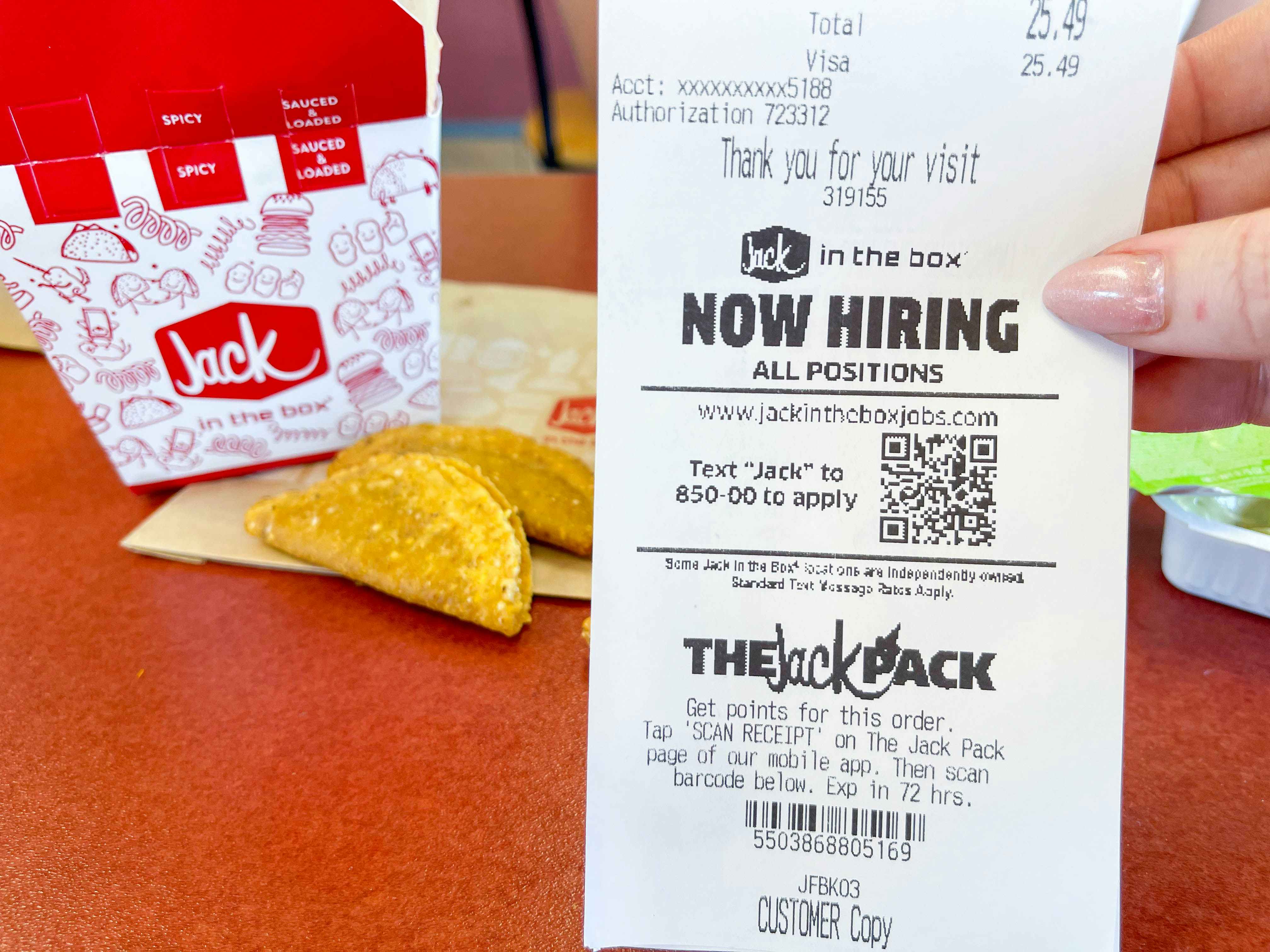 now hiring on receipt next to jack in the box tacos box