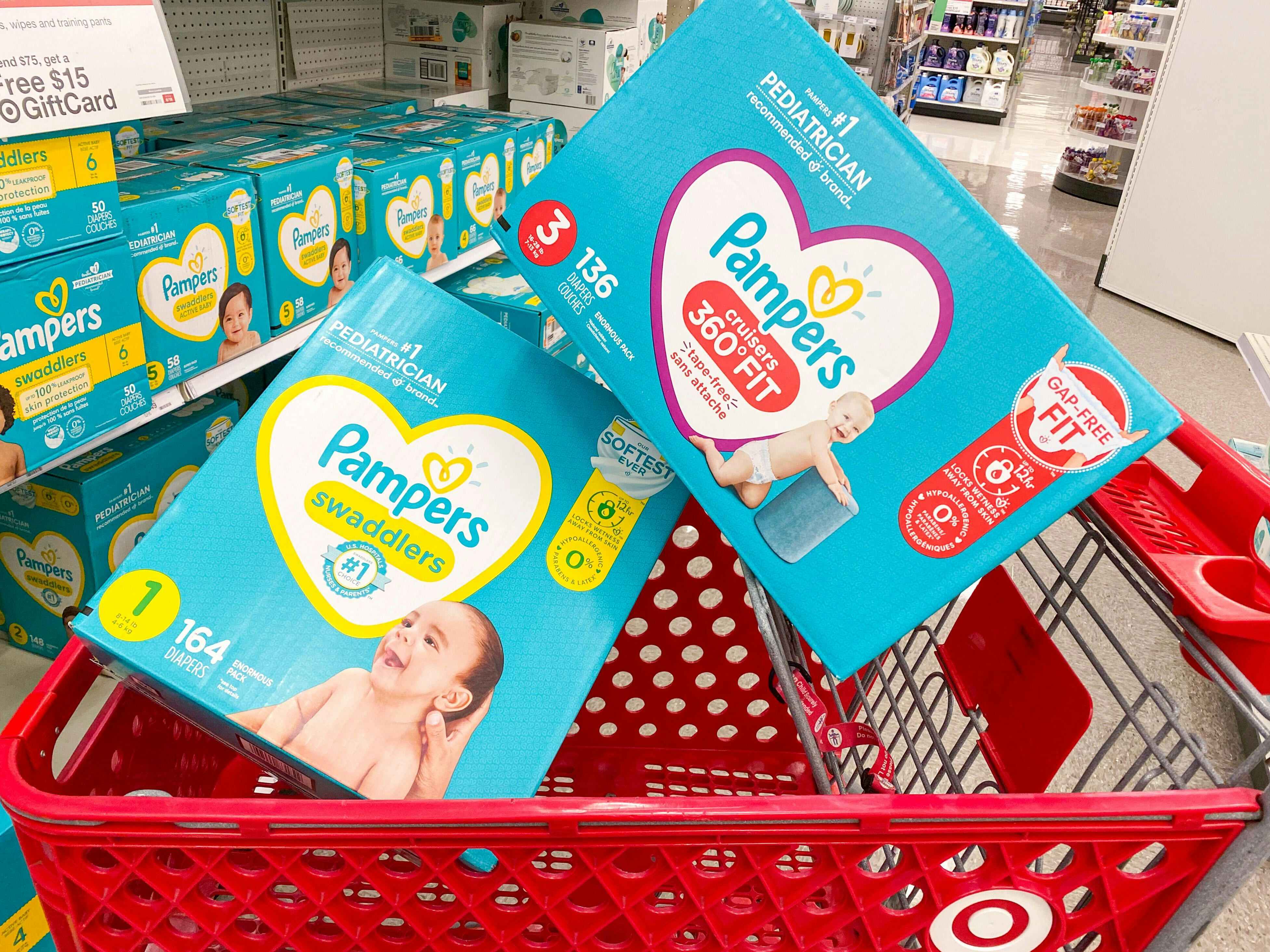 Two boxes of Pampers diapers stacked in a Target shopping cart