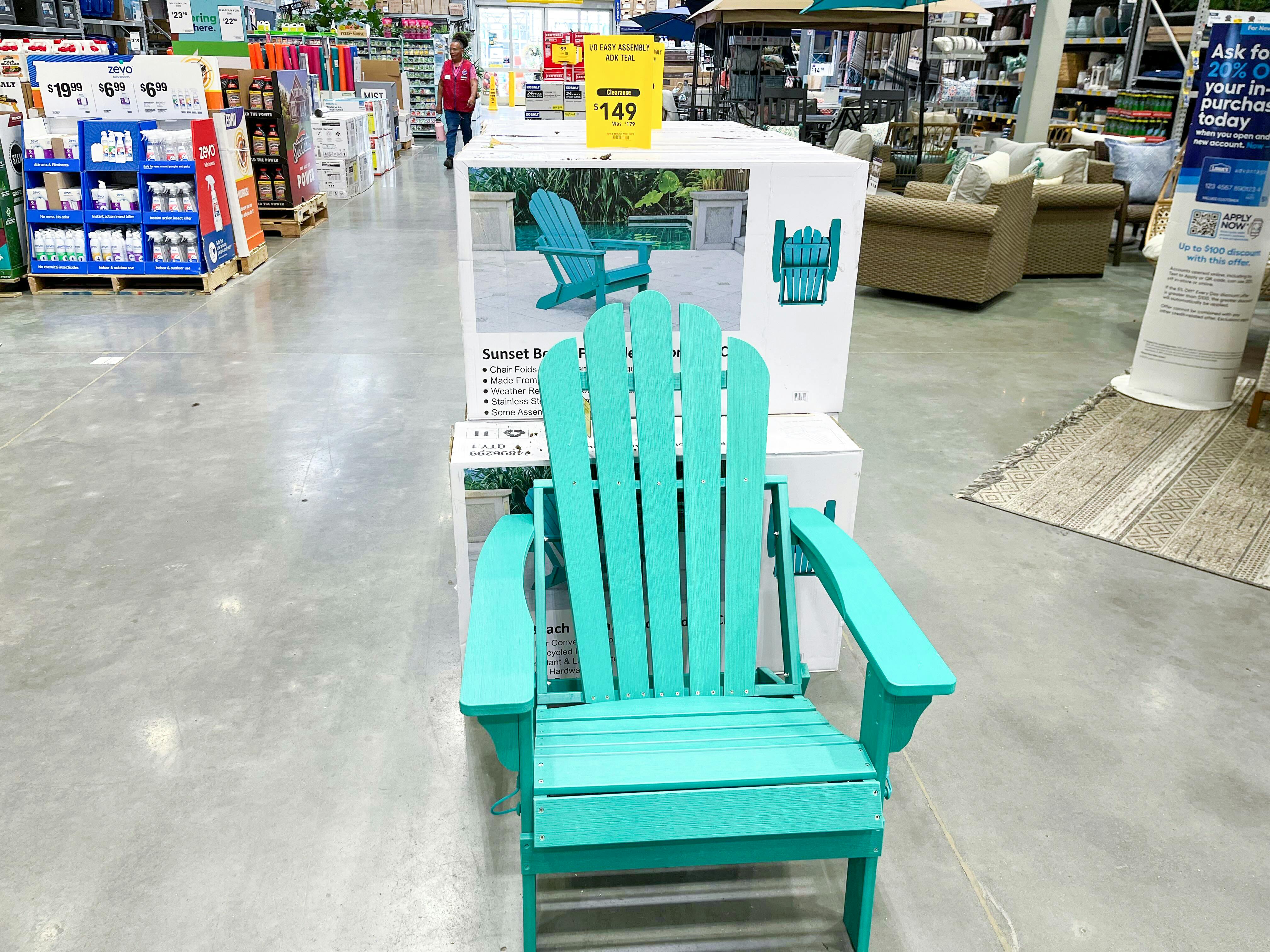 Clearance Patio chairs in the center aisle at Lowes.