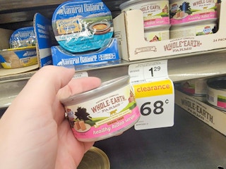 hand holding a can of whole earth farms healthy kitten cat food