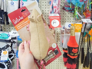Hand holding a clearance catnip toy at PetSmart