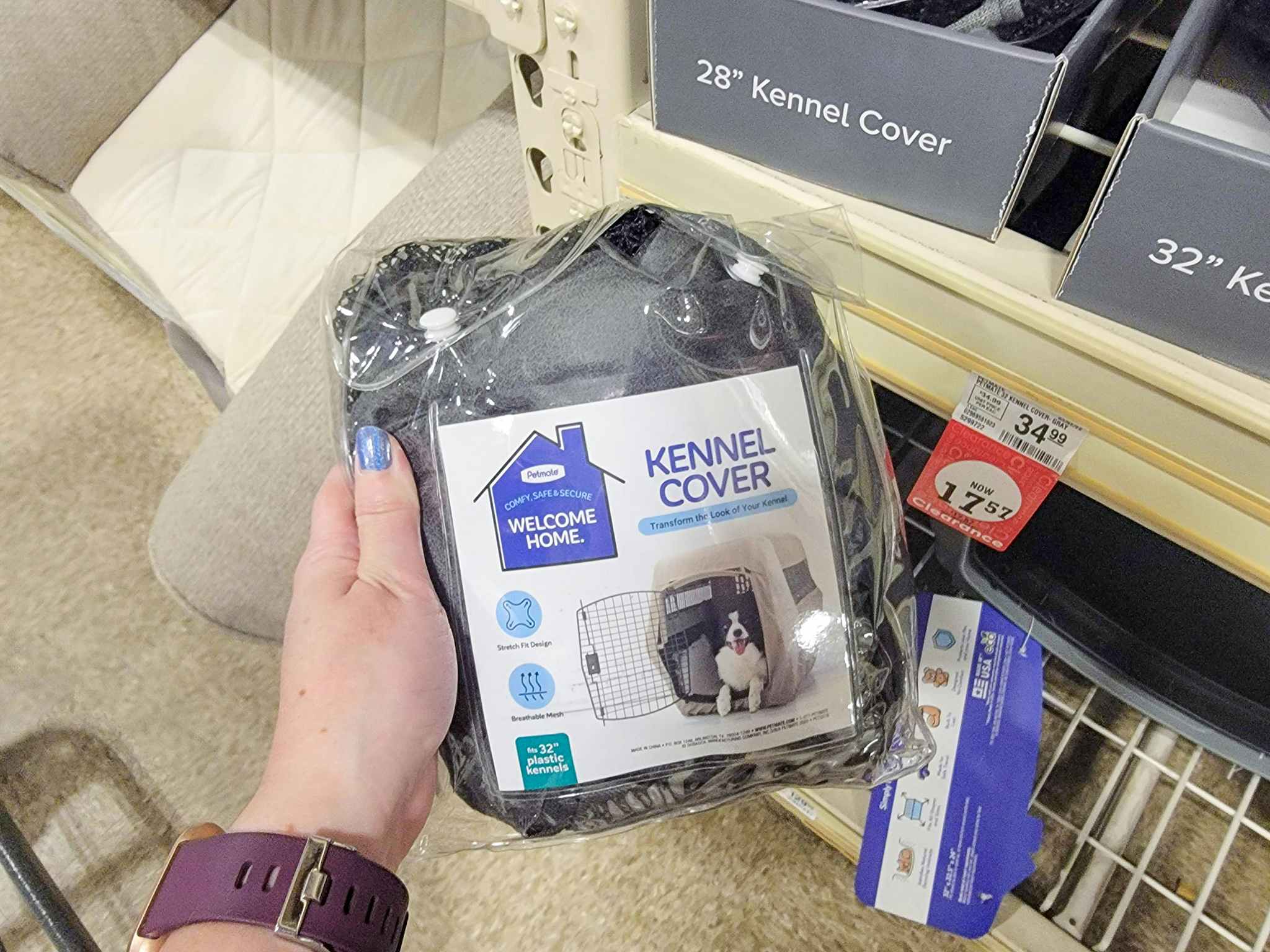 hand holding a kennel cover