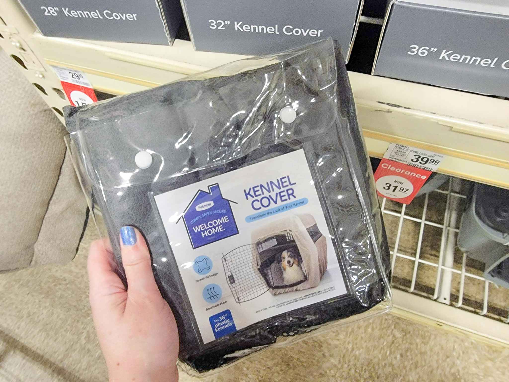 hand holding a kennel cover