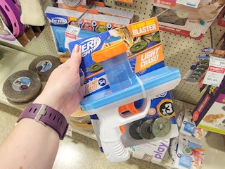 hand holding a nerf catnip blaster