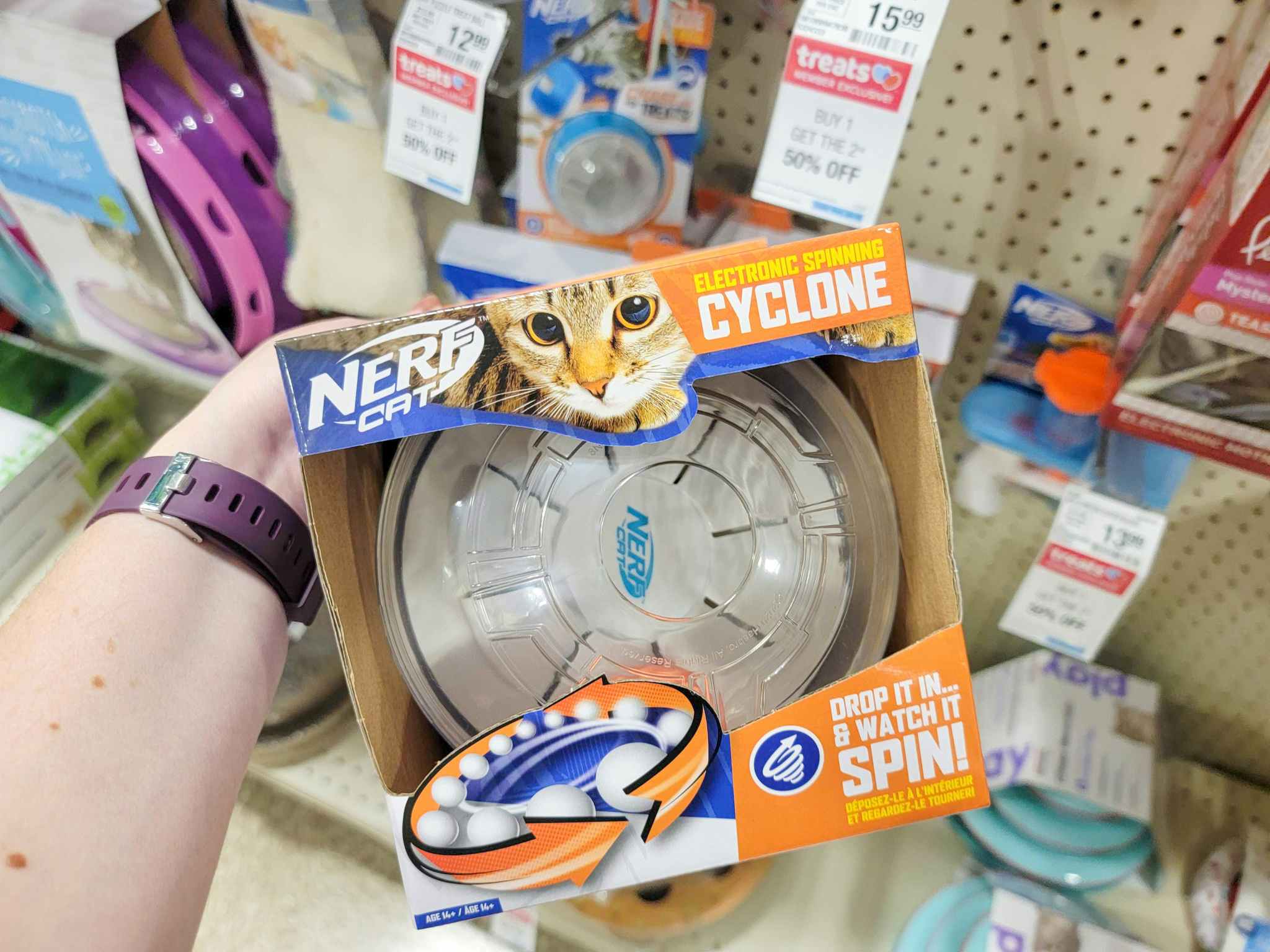 hand holding a nerf cyclone cat toy
