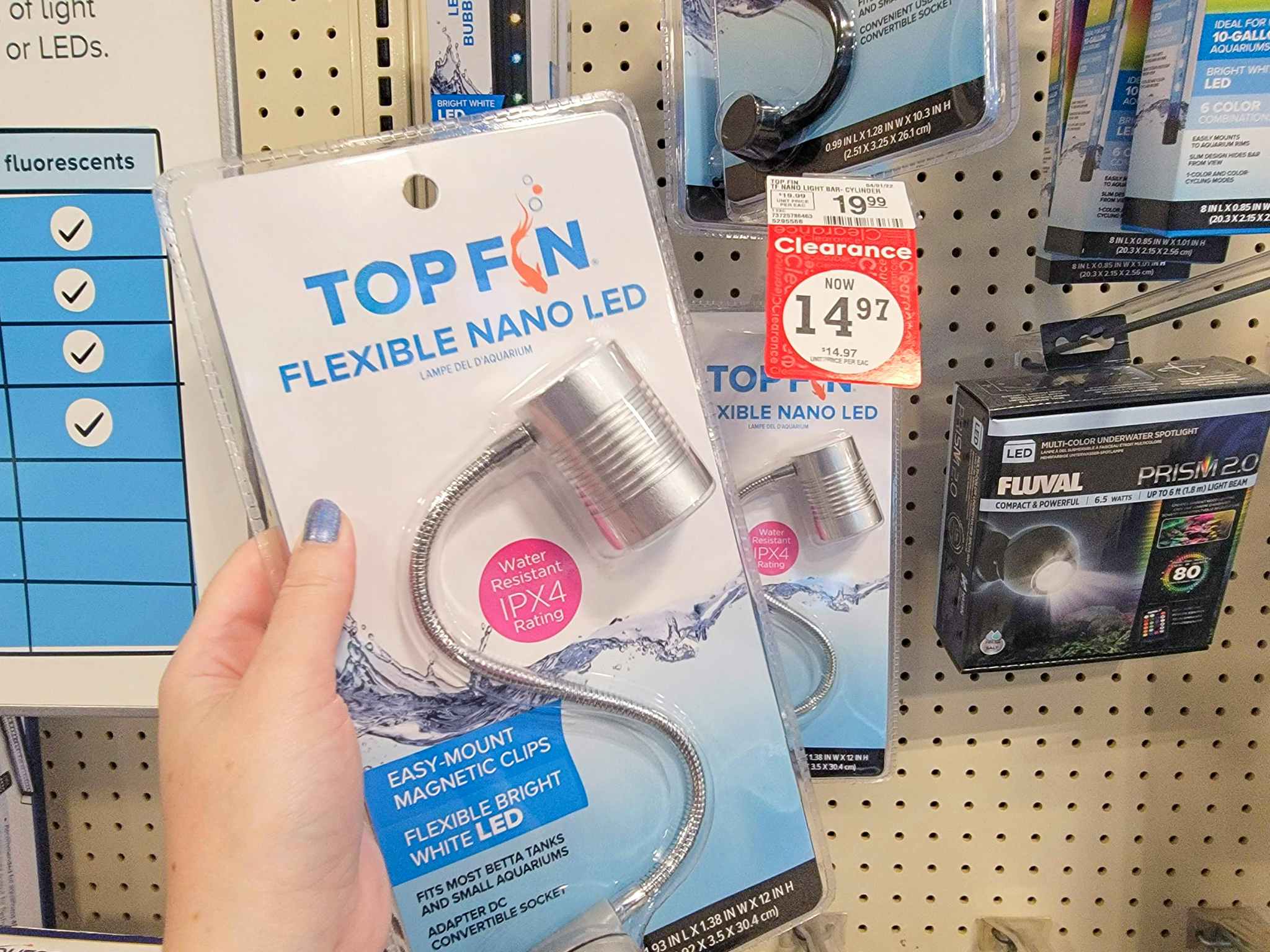hand holding a flexible nano led light for aquariums