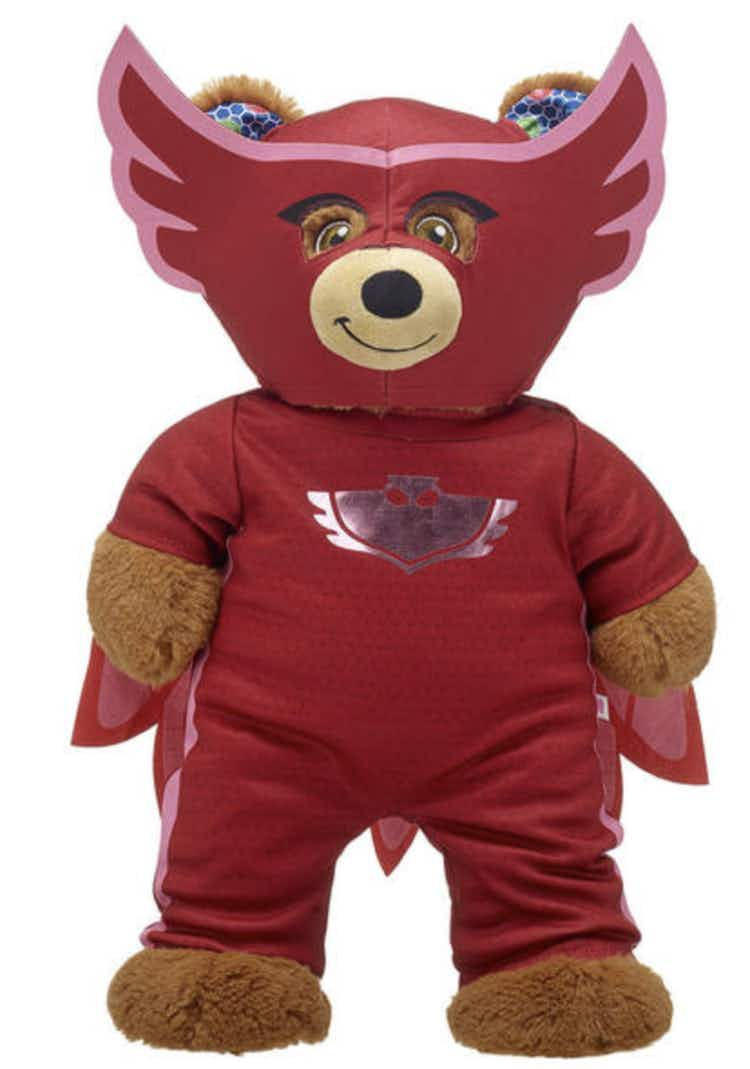 a build a bear wearing an owlette costume