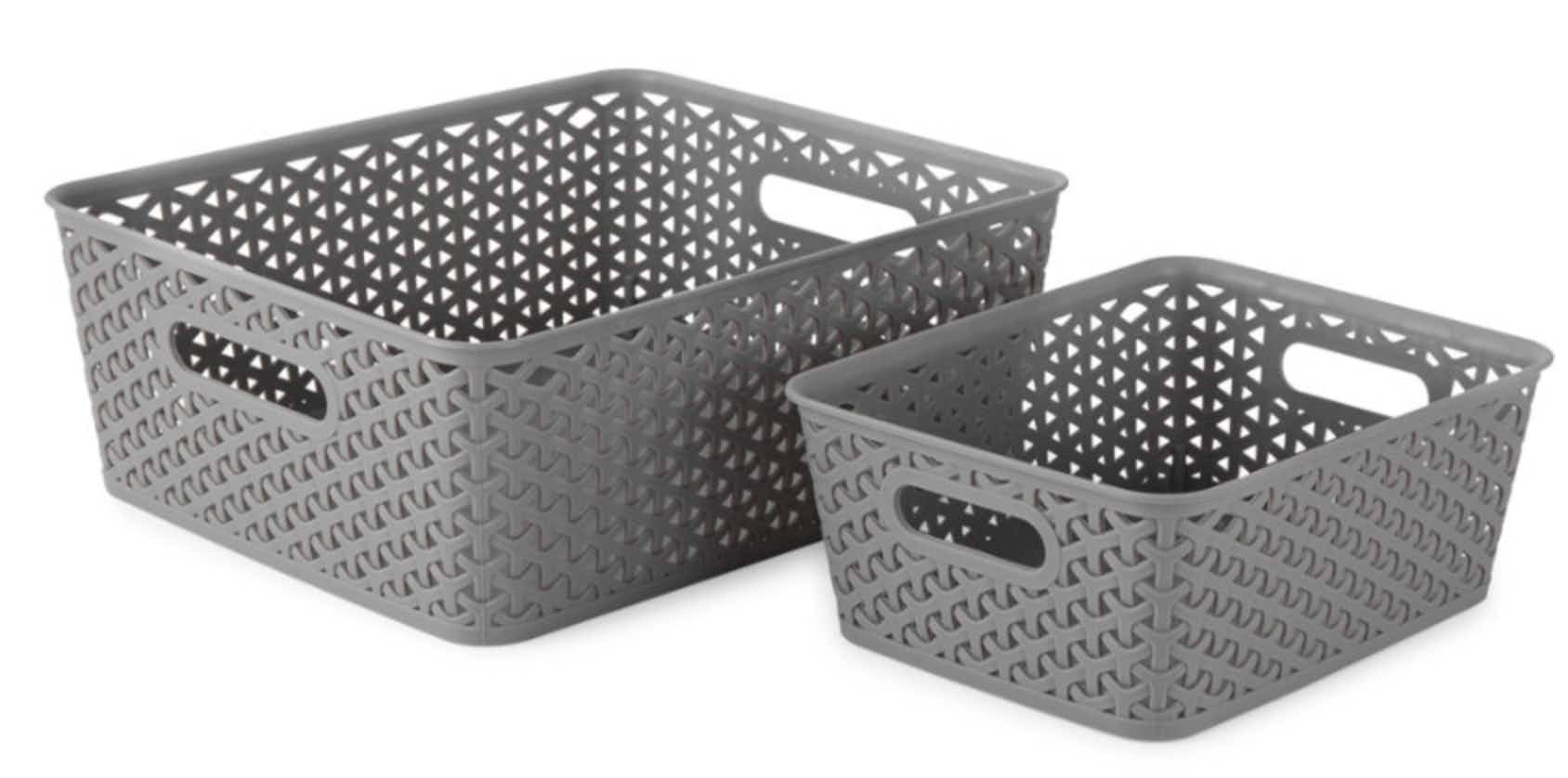 a large and medium plastic grey woven baskets