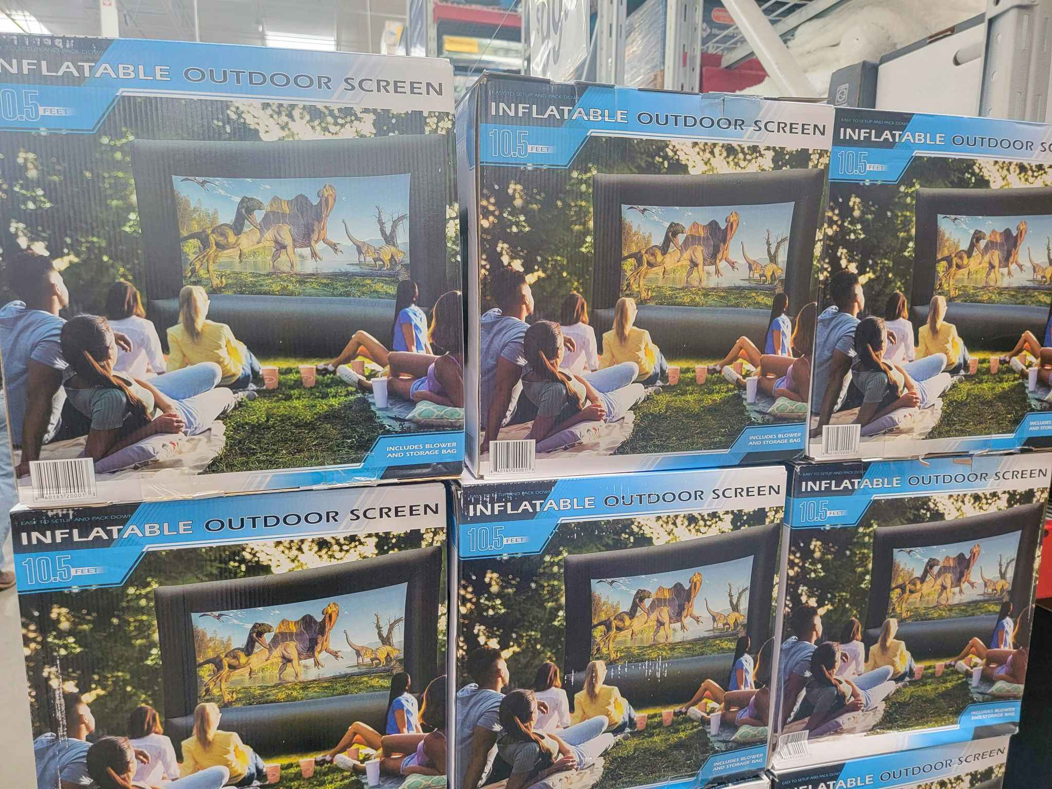 boxes of inflatable outdoor movie screens