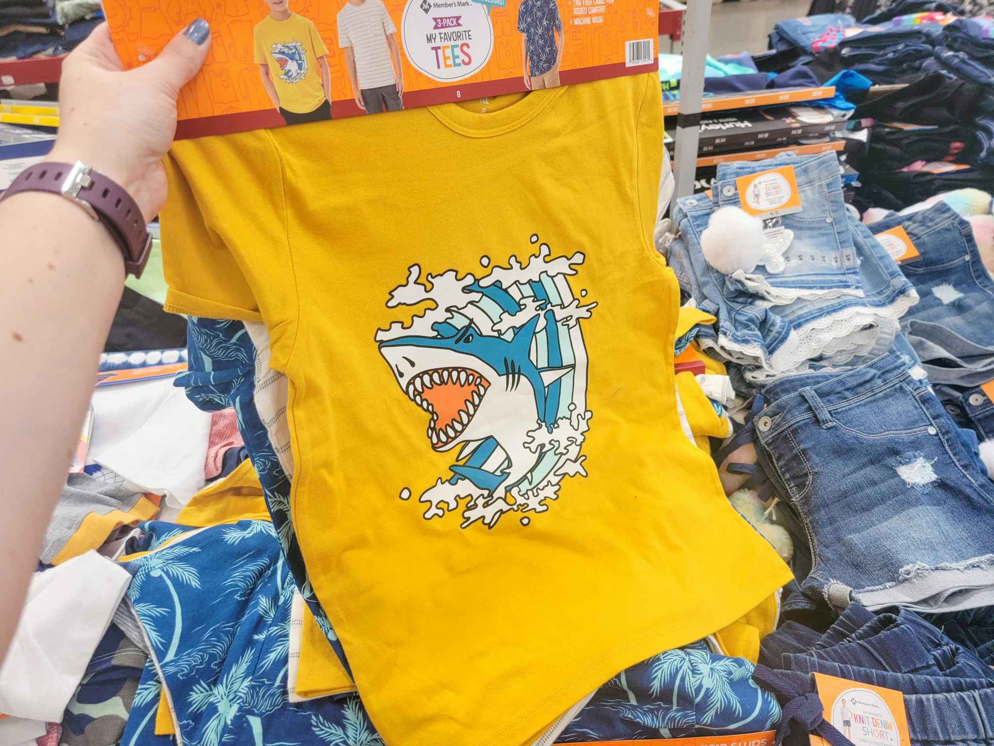 Set of 3 kids tshirts, the one in front is yellow with a shark on it