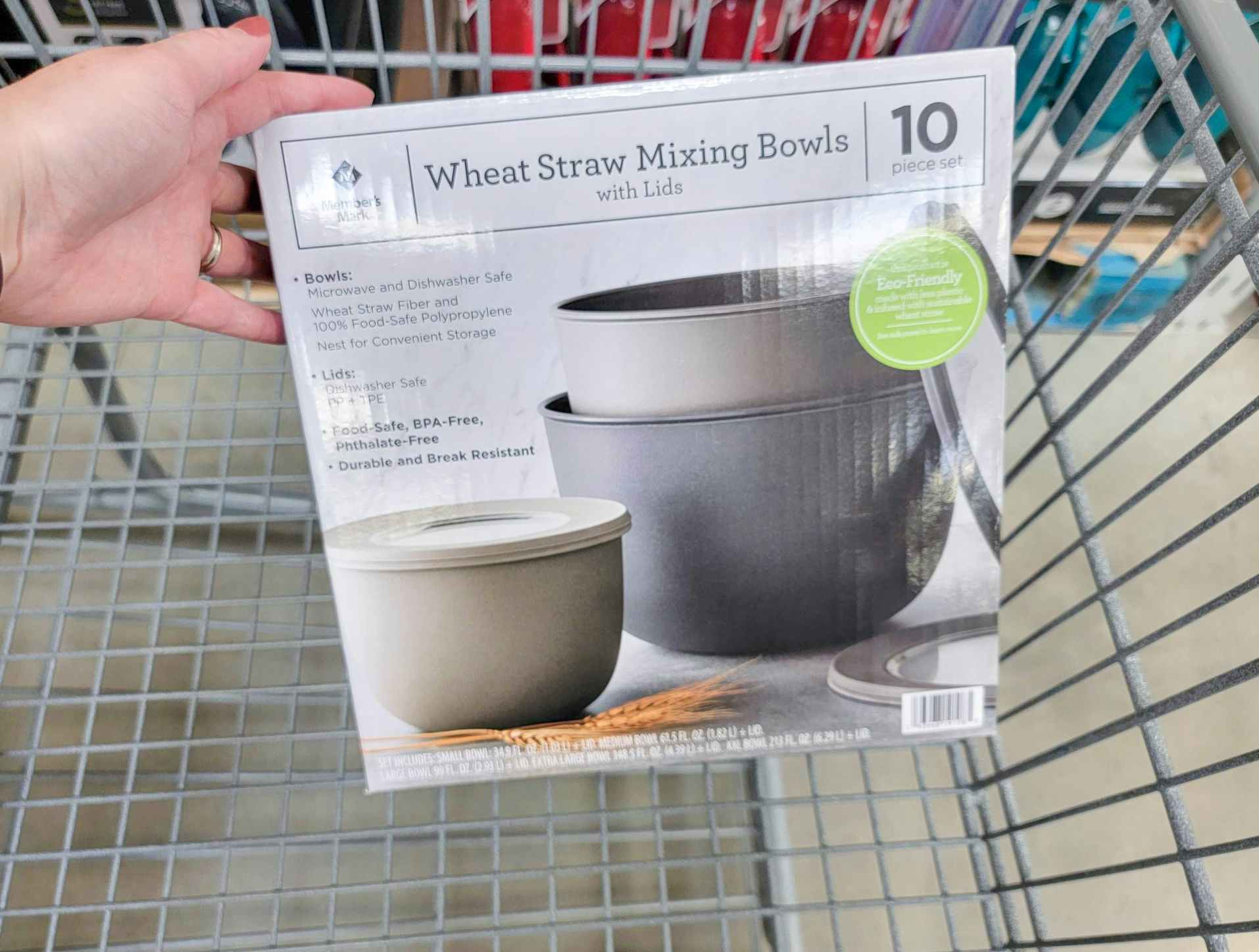 a set of grey mixing bowls in a cart