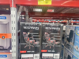 two respawn red and black gaming chairs in the boxes
