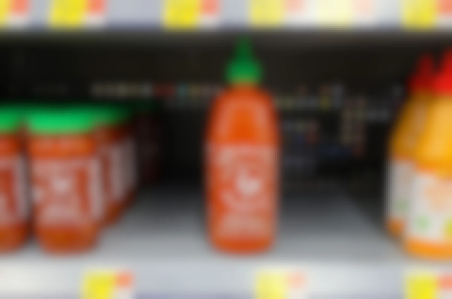 Single bottle of Sriracha hot sauce remains on the shelf at Walmart