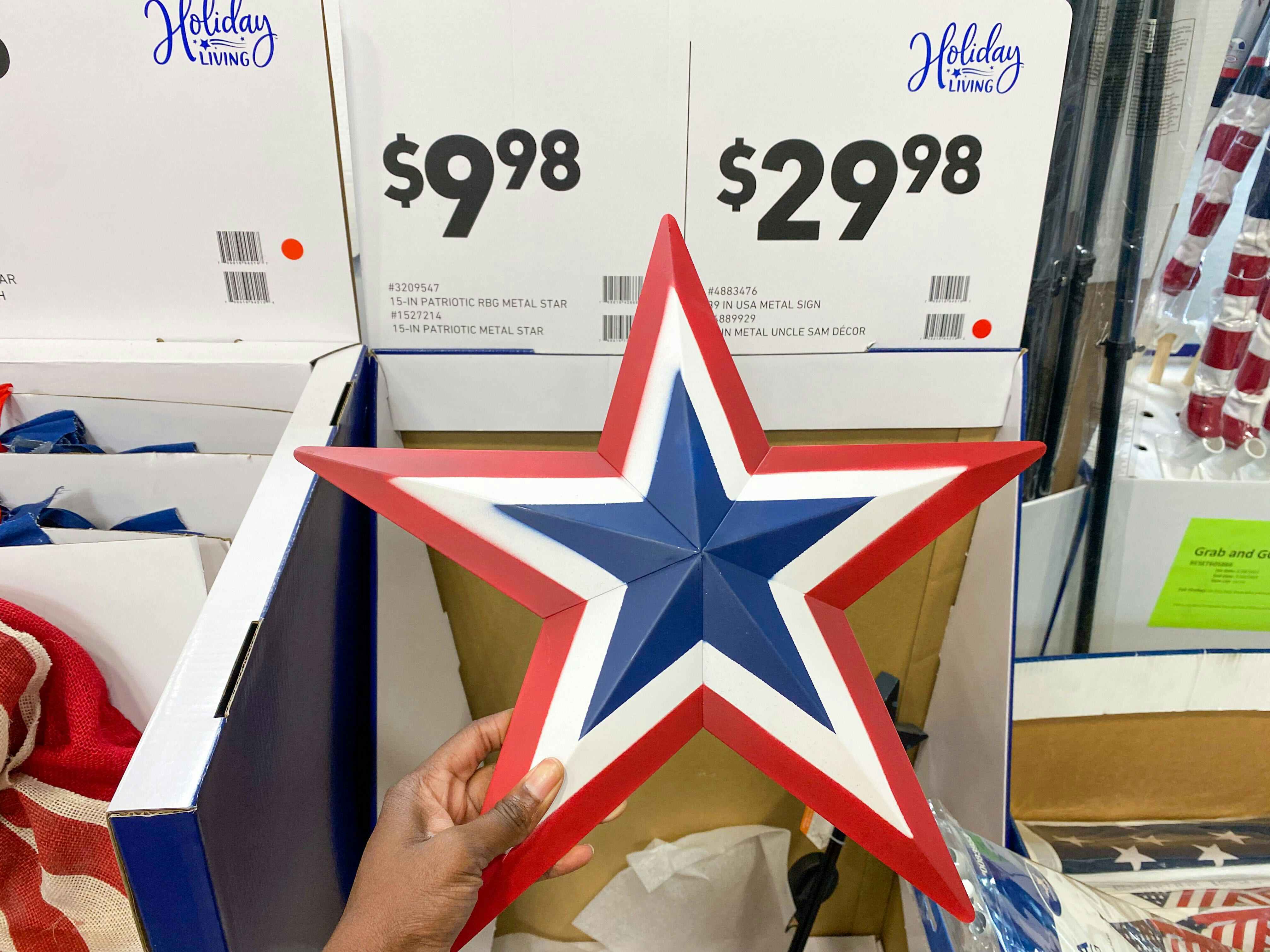 metal star decor at Lowe's in front of sale sign