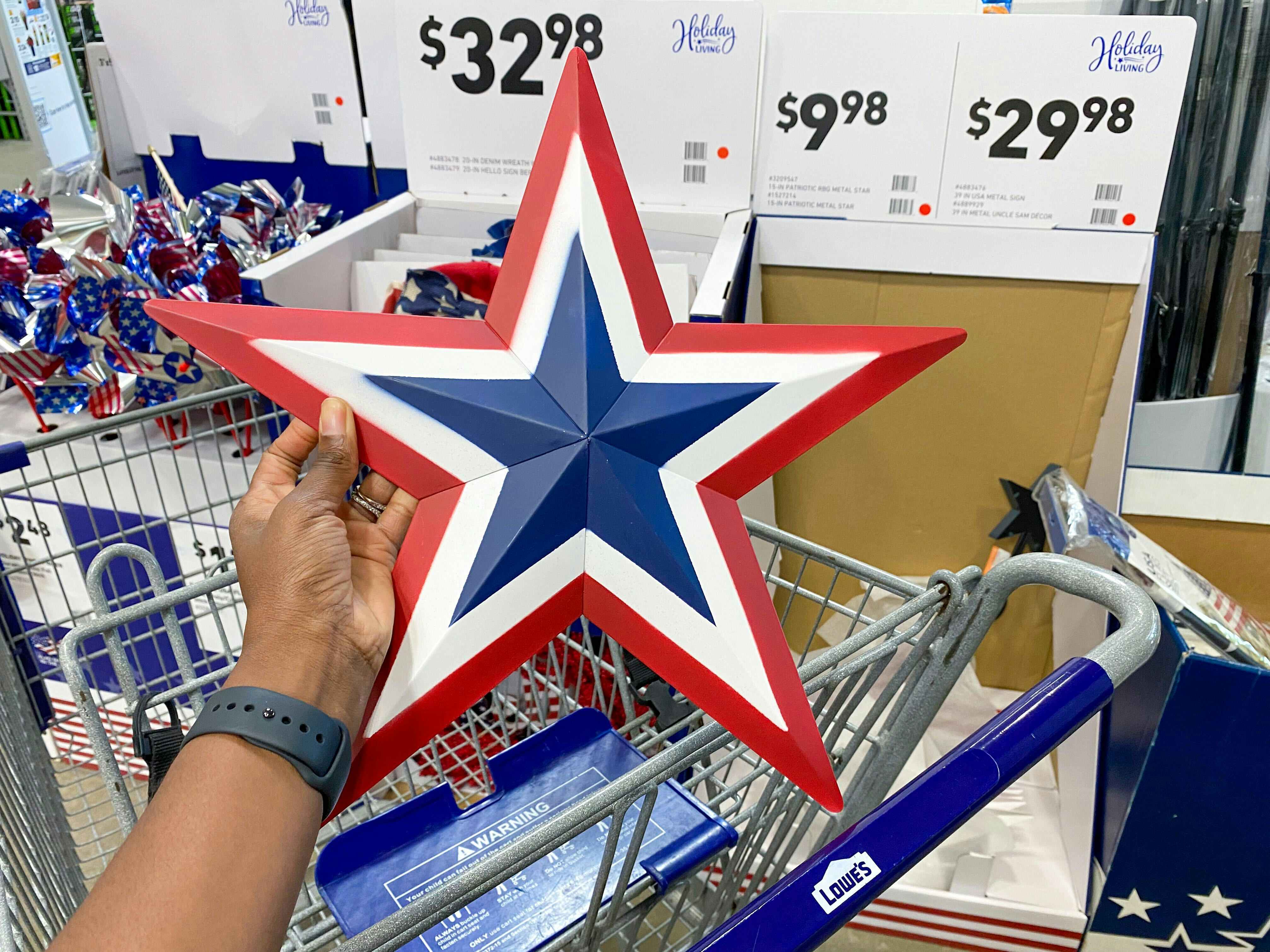 metal star decor at Lowe's in front of sale sign