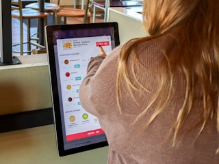 a person ordering at taco bell