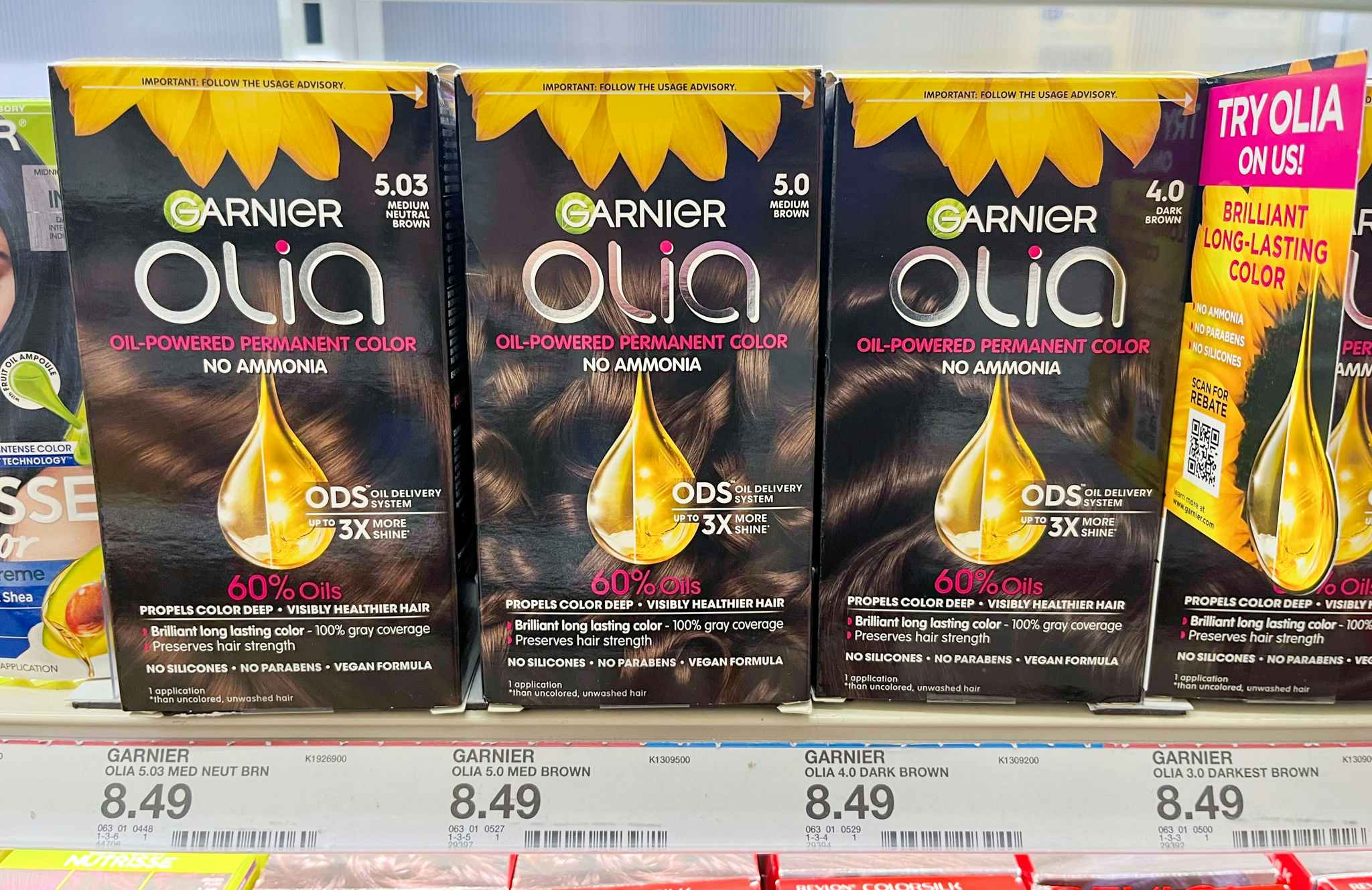 Garnier Olia Hair Color products on shelf at Target. Sticker on shelf indicates that the price is $8.49.