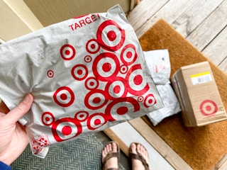 a bunch of Target packages on the doorstep of someone's home