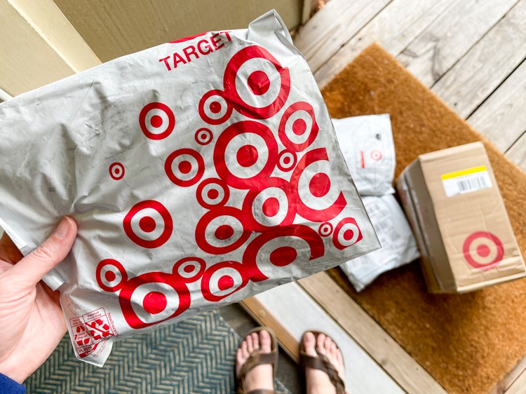 a bunch of Target packages on the doorstep of someone's home