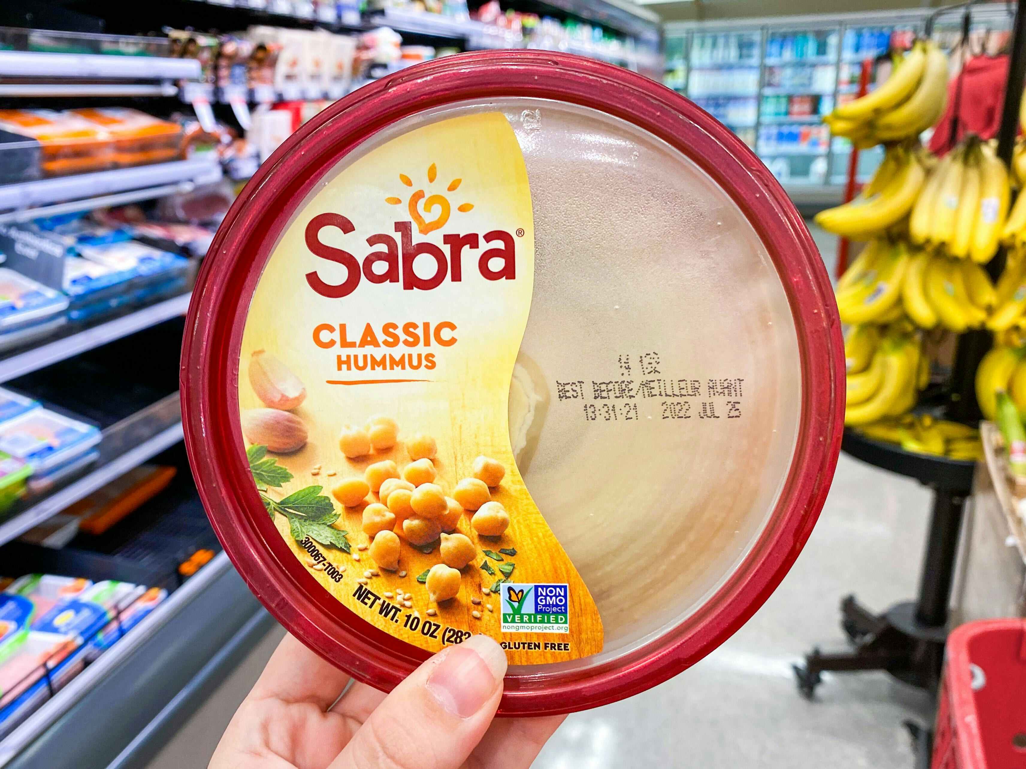 Sabra Classic Hummus held in refrigerated section at Target